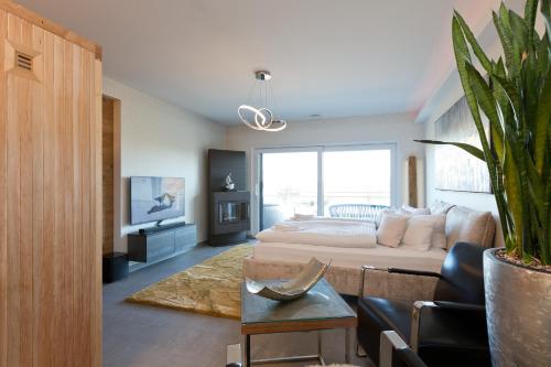 En eller flere senge i et værelse på Kells Appartements