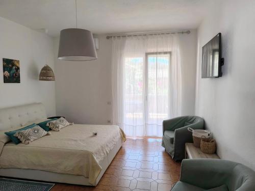 Letto o letti in una camera di Villa Rosa