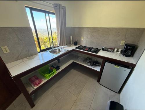 Kuchyň nebo kuchyňský kout v ubytování Sunset Farms and Waterfalls!