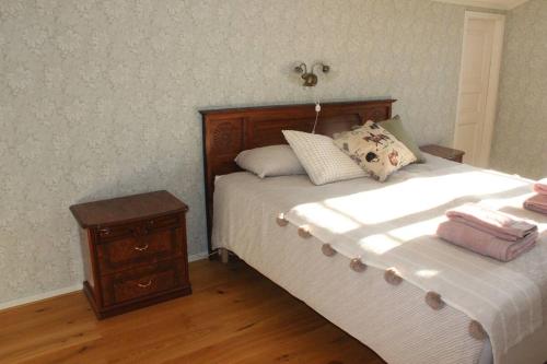 En eller flere senge i et værelse på Per Larsgård