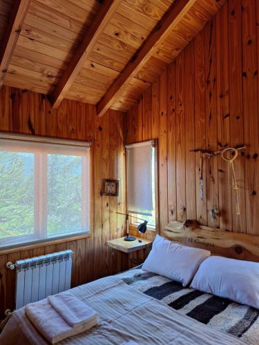 Postel nebo postele na pokoji v ubytování Parajes del Lejano sur Cabaña El Choique