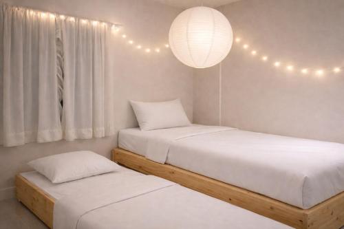 Ein Bett oder Betten in einem Zimmer der Unterkunft Madison Park Apartments by Host Jess