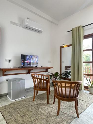 Et tv og/eller underholdning på Tangalle Bay Beach Villa