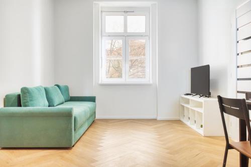 Modern City Apartment with Balcony by Rentez