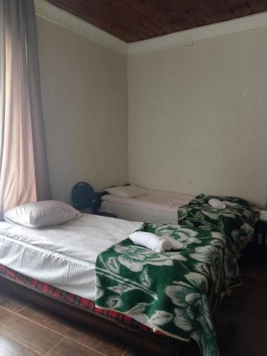 En eller flere senge i et værelse på Sweetnight apartments