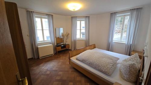 Postel nebo postele na pokoji v ubytování Historic Merchant House - History & Modernity