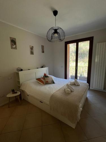 En eller flere senge i et værelse på Residenza degli Olivi