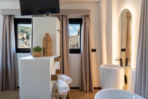 a white room with a view of a city at Las Amiras Homes Collection in Granada