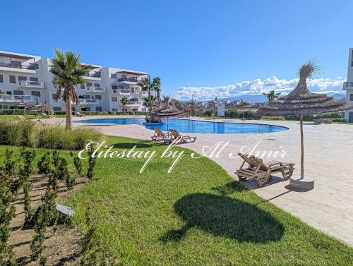 a view of a pool at a resort at Elite'Stay by Al Amir in Cabo Negro