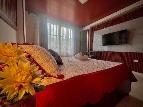 En eller flere senge i et værelse på Wiky House Guaduas