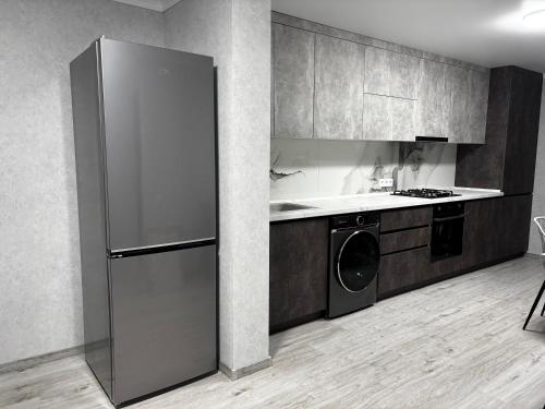 ครัวหรือมุมครัวของ New apartment Căușeni