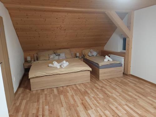 Postel nebo postele na pokoji v ubytování Apartmány Gabriela