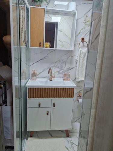 Et badeværelse på Pousada Temporada Familiar