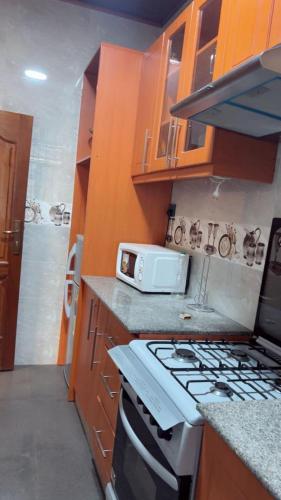 ครัวหรือมุมครัวของ Gratien apartment