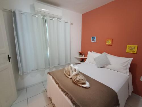 En eller flere senge i et værelse på Mila Mar Flat