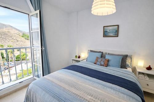 Giường trong phòng chung tại Casa Zicman Las Teresitas