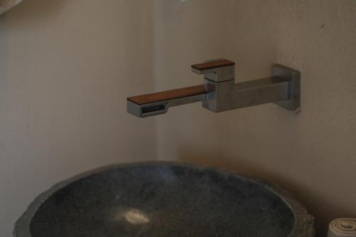 a sink in a bathroom with a faucet at trekløveren in Covington
