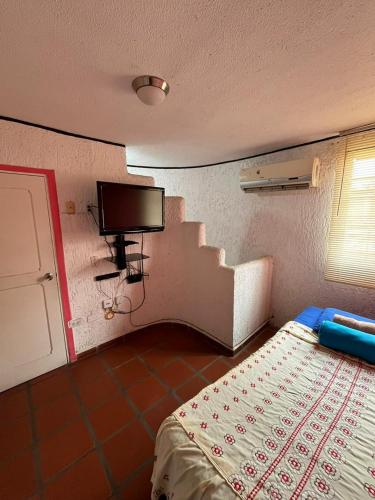 Llit o llits en una habitació de Townhouse Vacacional