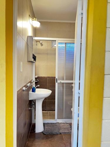 a bathroom with a sink and a shower at Balcones de Bialet in Bialet Massé