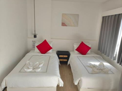 Letto o letti in una camera di Jellyfish Residence Patong