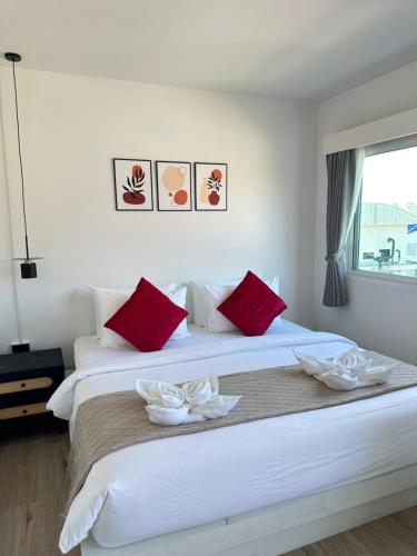 Letto o letti in una camera di Jellyfish Residence Patong