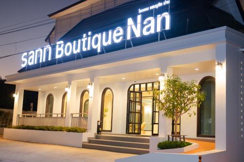 a store front with a sign that reads san burrito man at Sann Boutique Nan in Nan