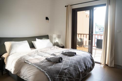 Кровать или кровати в номере Cozy Villa
