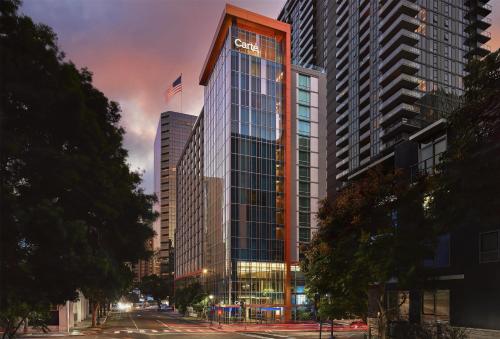 a tall building with a sign on the side of it at Carte Hotel San Diego Downtown, Curio Collection By Hilton in San Diego
