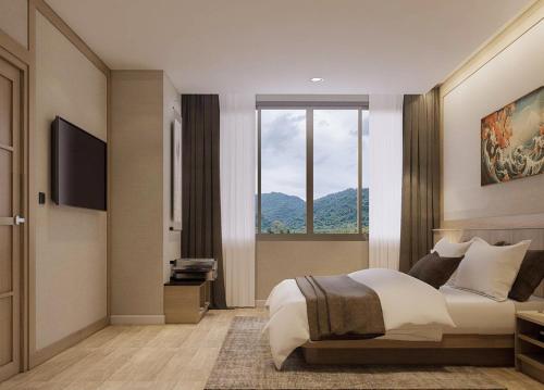 a bedroom with a bed and a large window at Zen Essence Khao Yai in Ban Tha Maprang