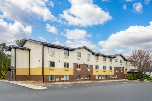 an apartment building on the side of a street at Super 8 by Wyndham Hagerstown I-70 in Hagerstown