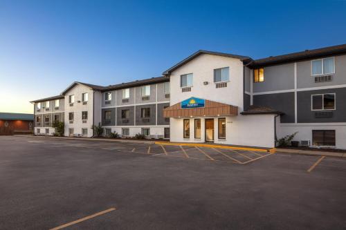 an empty parking lot in front of a building at Days Inn by Wyndham Omaha NE in Omaha