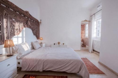 Postel nebo postele na pokoji v ubytování Maison ltoile de Sidi Bou Sad - 360 Sea View