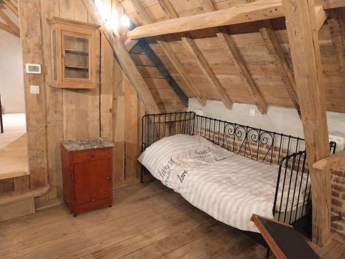 En eller flere senge i et værelse på La belle échappée & Romence