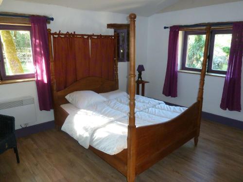 Postel nebo postele na pokoji v ubytování Le gîte de Paxou