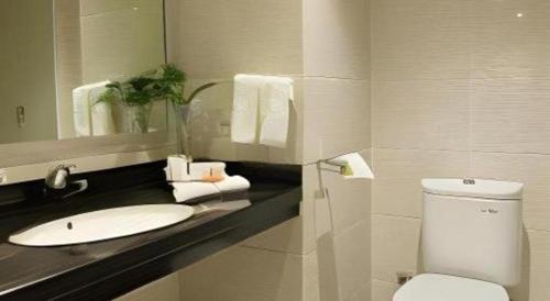 Koupelna v ubytování Aria Barito Hotel