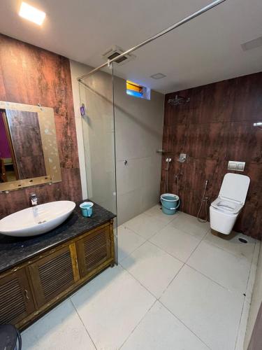 a bathroom with a sink and a toilet at Honeycomb Abode in Salem