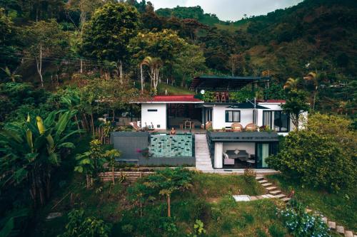an aerial view of a house in a forest at Casa Margarita Loft in Buenavista