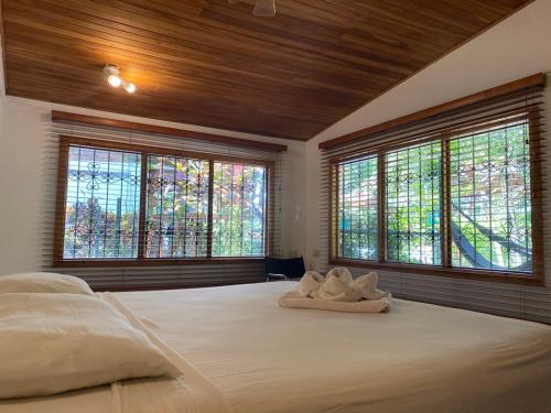 Postel nebo postele na pokoji v ubytování Casa Aba Matapalo