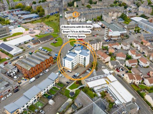 an aerial view of a city with a yellow circle at Bellfield by CENTRAL SERVICED APARTMENTS - Walk away from Dundee University - 2 Bedrooms - 2 Bathrooms - 2 King Beds - Smart TVs - Fully Equipped - Parking - Close to City Centre in Dundee