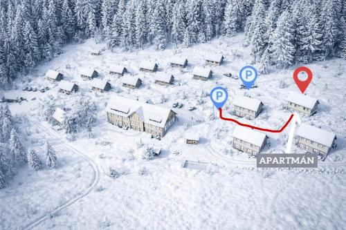 Apartmán U lesa om vinteren