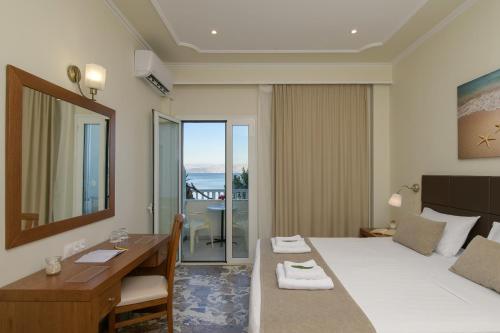 Hotel Kaiser Bridge tesisinde bir odada yatak veya yataklar