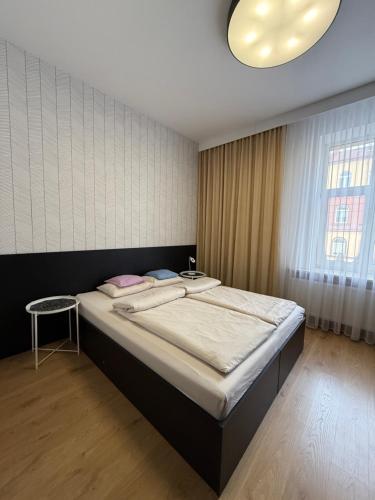 Postel nebo postele na pokoji v ubytování Apartamenty Premium Loft