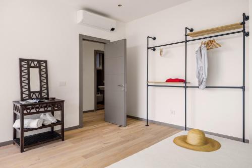 a room with a closet with a hat on the floor at Rotolo Roof 21 5C in Catania
