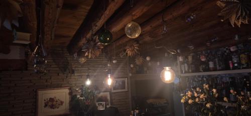 a room with some lights and a brick wall at Locanda Toronto in Moriago della Battaglia