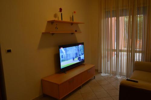 Residence Verbenaにあるテレビまたはエンターテインメントセンター