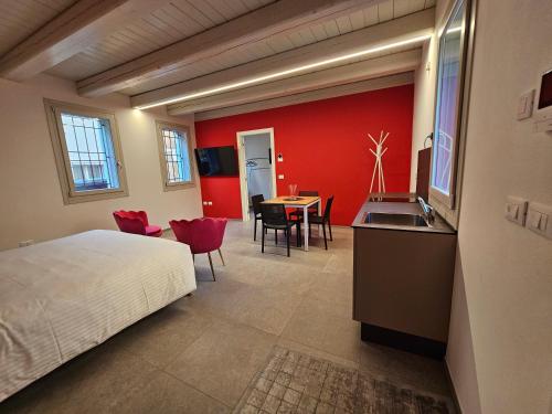 Postel nebo postele na pokoji v ubytování Palazzo Glicine