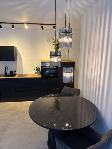 Kuchyň nebo kuchyňský kout v ubytování Exklusives City-Apartment mit Gartenidylle an den Paderwiesen