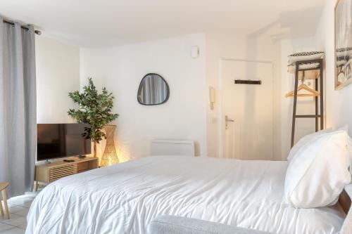 Ảnh trong thư viện ảnh của Studio Moderne avec jardin et garage ở Nanterre