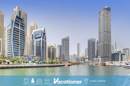 Vacationer Holiday Homes I 2 Bedroom I Marina Views I Steps away from Beach I Gym, Pool, Parking & Wi-Fi