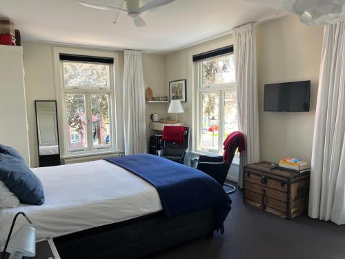 Postel nebo postele na pokoji v ubytování Room One-Twenty-One